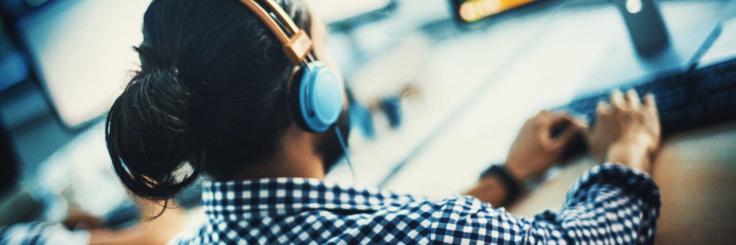 professional sitting at a computer