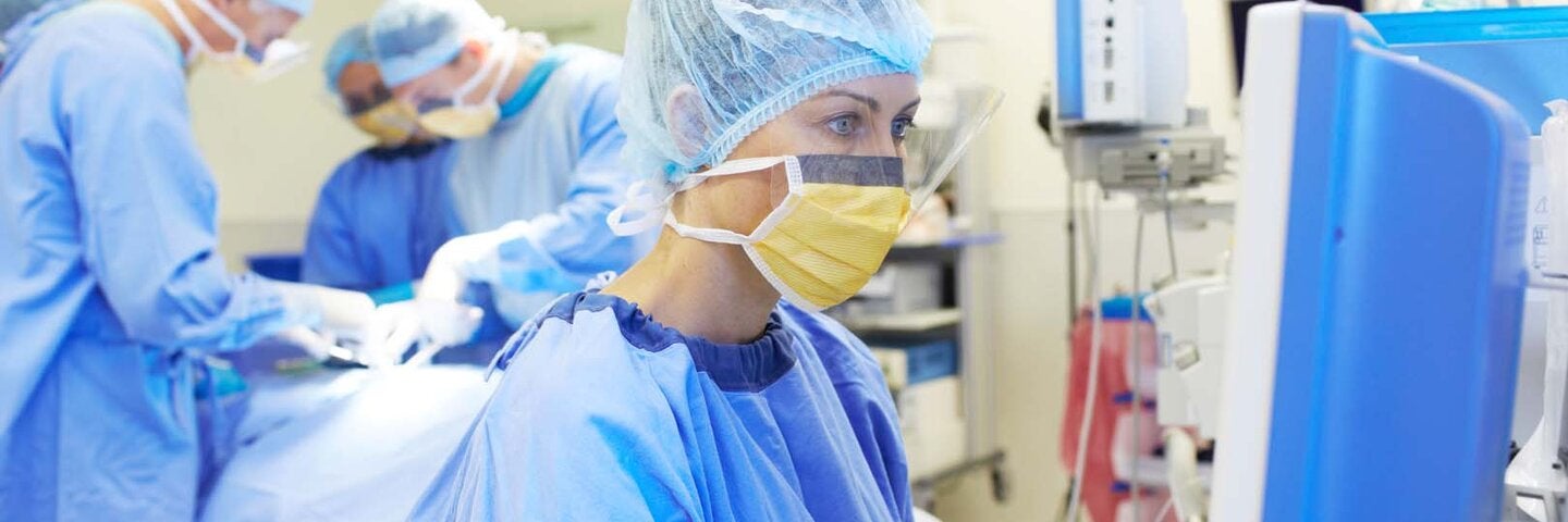 Female RN first assistant in the operating room