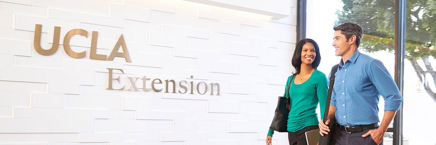 Students walking into the Gayley Center