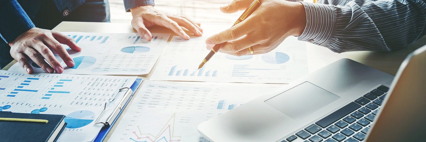 accountants discussing their results