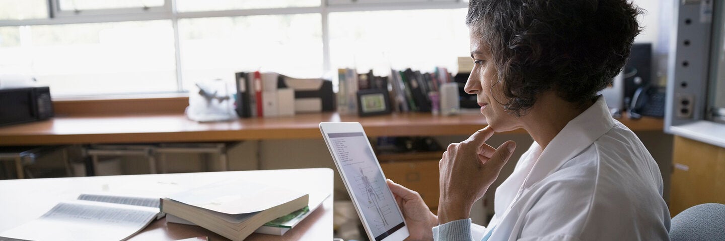 teacher planning at her desk