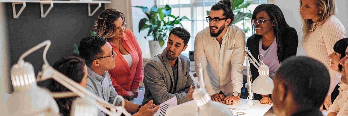 Group of business professionals around a table