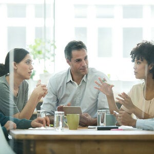 people around a conference table