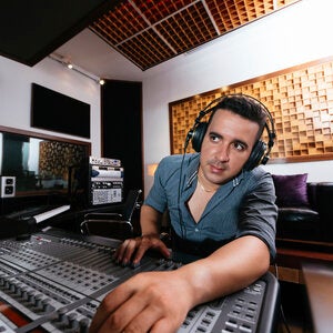 Male listening music headphones